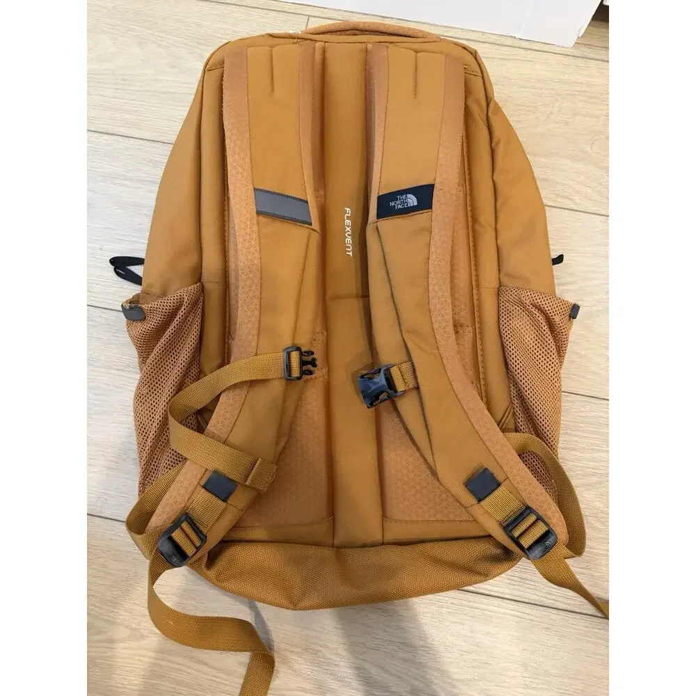 The North Face Stalwart Backpack in timber tan, customized w/a Logo.